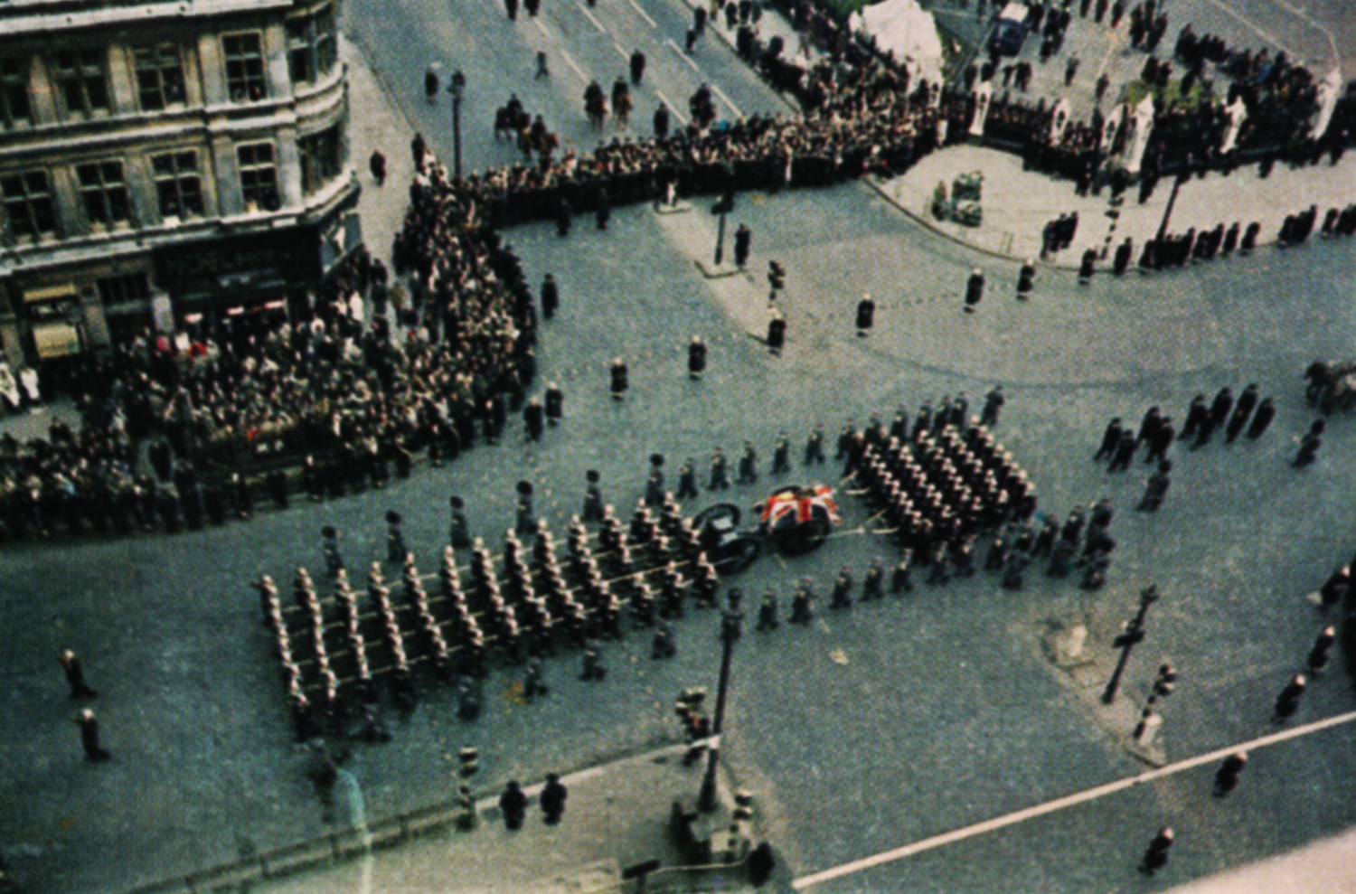 Aerial view of the procession, in colour